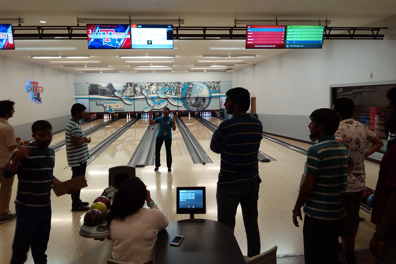 Graduate social at a bowling alley