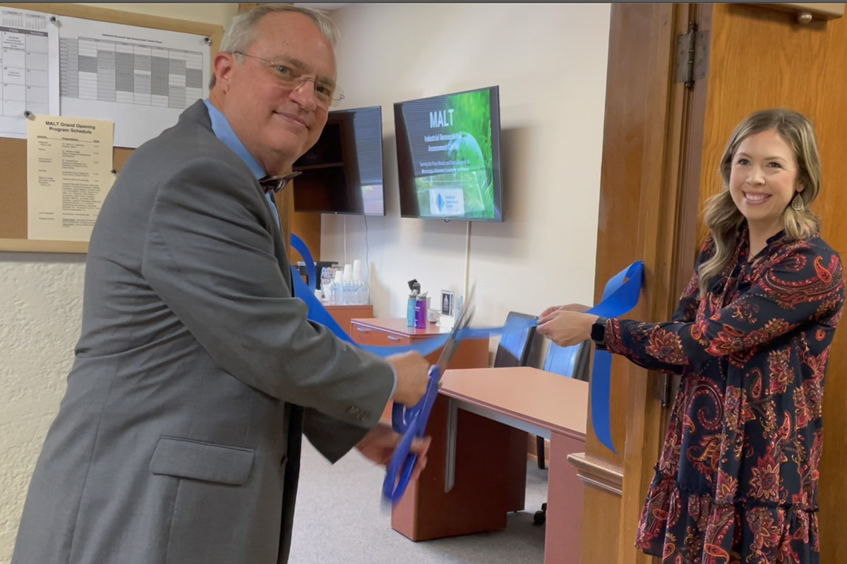 Bruce Siegmund, Councilman, Ruston, Ward 5 and Emma Herrock, District Director for Congresswoman, Julia Letlow, perform the ribbon cutting ceremony for the grand opening of MALT.