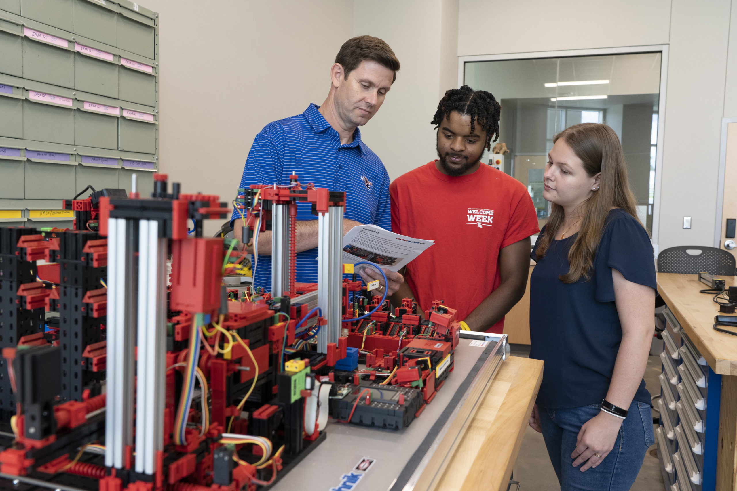 Dr. Easley explaining a project to students