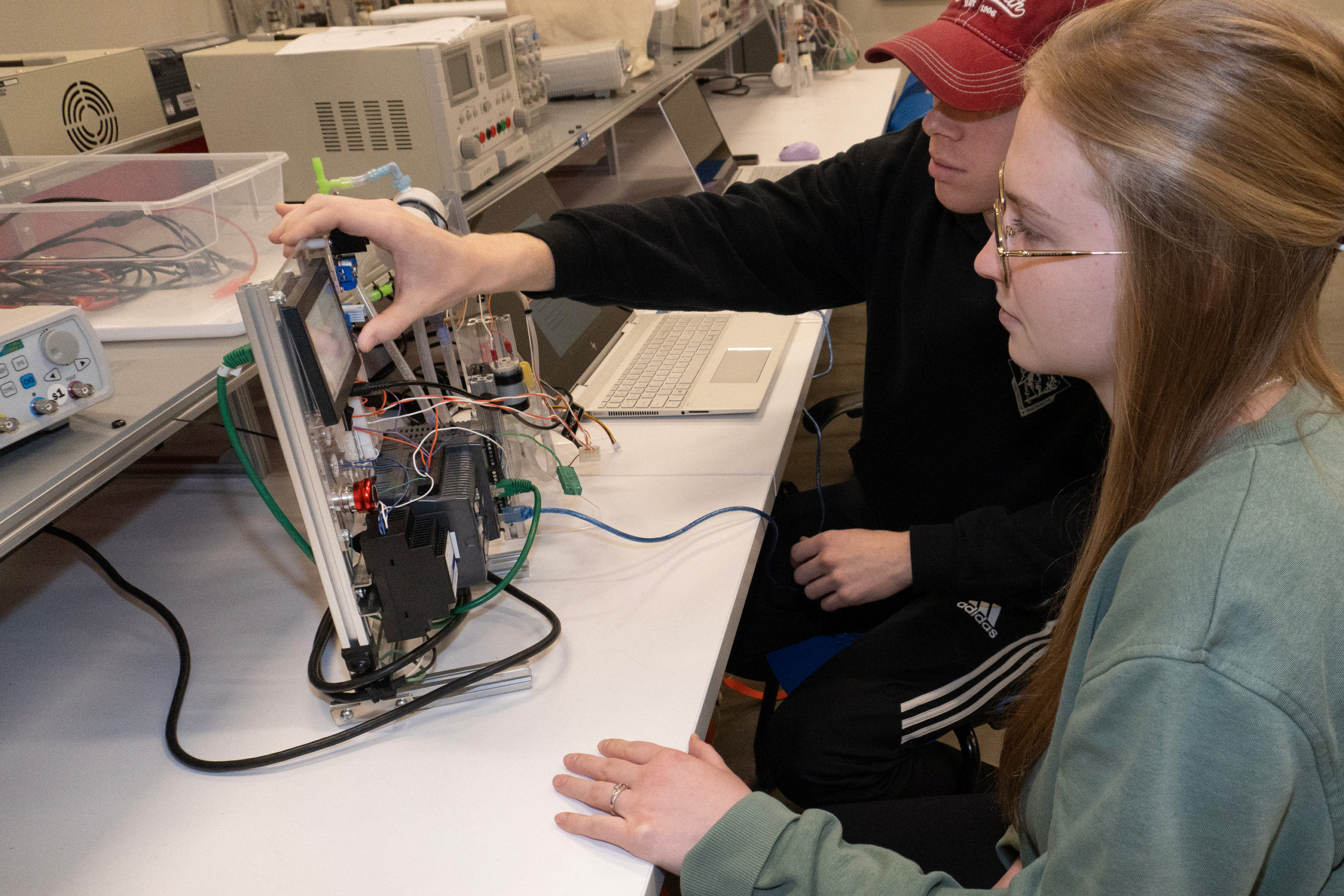Students working on a control system