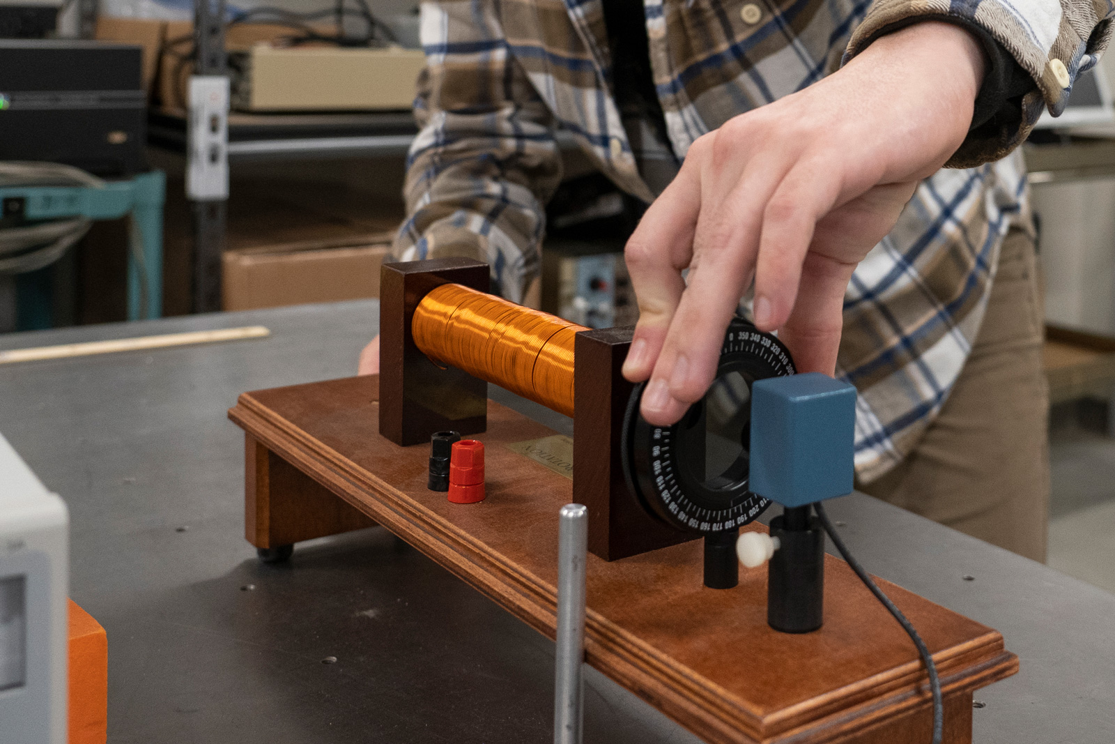 Student working on a spooling machine