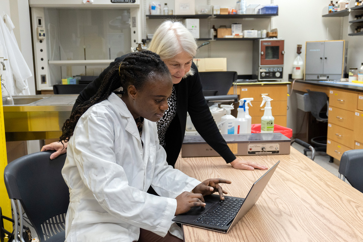 Dr. Murray working with a student